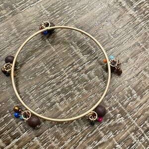 Jewelry - gold bangle  bracelet with black beads